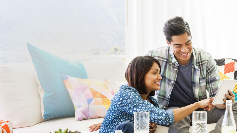 Couple using iPad
